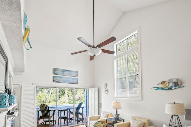 interior space featuring high vaulted ceiling, ceiling fan, and a wealth of natural light