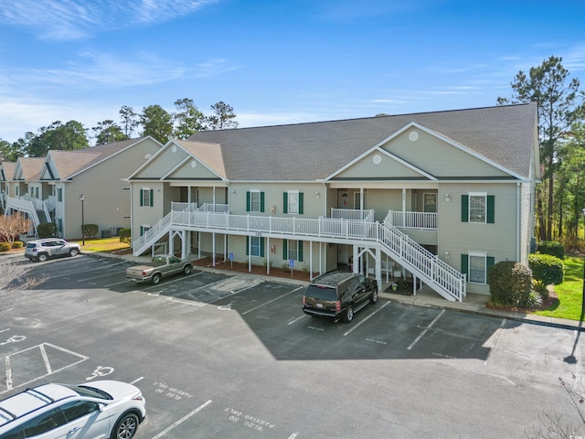 view of front of property with a balcony