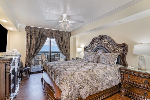 bedroom with a textured ceiling, access to exterior, ceiling fan, and dark wood-type flooring