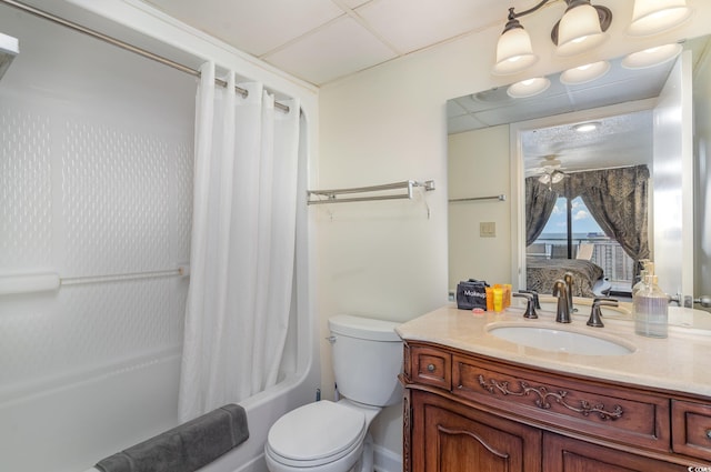 full bathroom with ceiling fan, shower / bath combination with curtain, toilet, and vanity