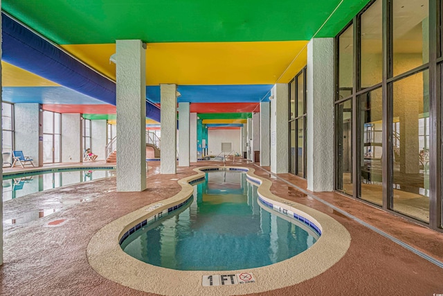 view of swimming pool featuring a patio area