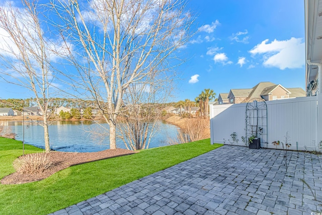 view of patio / terrace with a water view