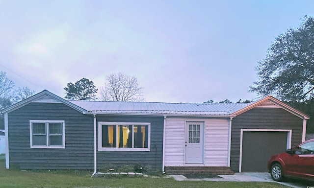 view of front of property with a garage