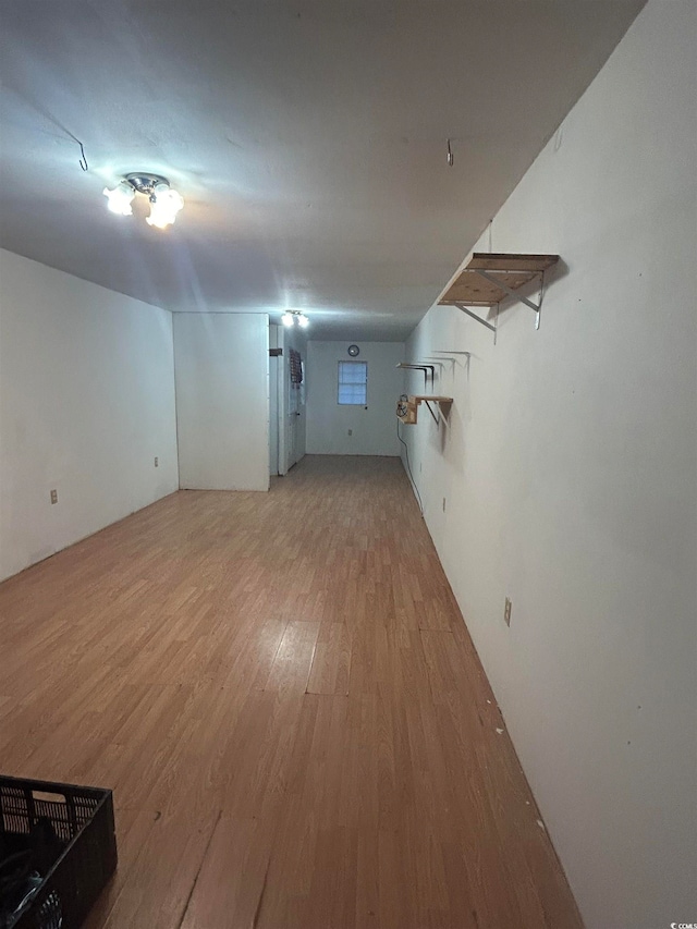 basement featuring wood-type flooring