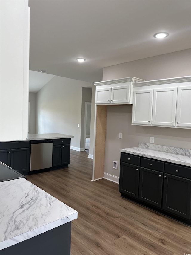 kitchen with dark wood finished floors, white cabinetry, baseboards, dishwasher, and dark cabinets