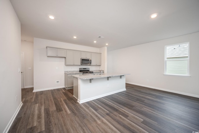 doorway with hardwood / wood-style flooring