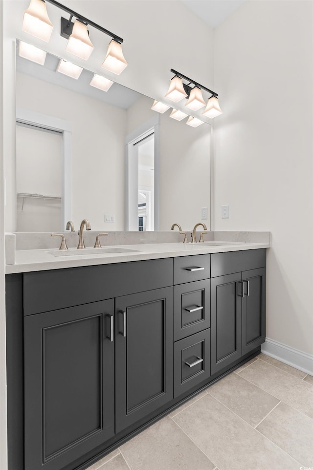 bathroom with tile floors and dual vanity