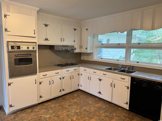 kitchen featuring black dishwasher, sink, white cabinets, white gas stovetop, and oven