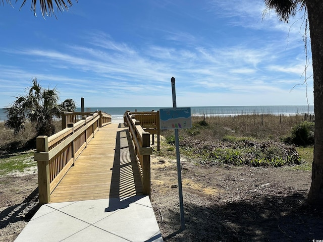 view of home's community with a water view