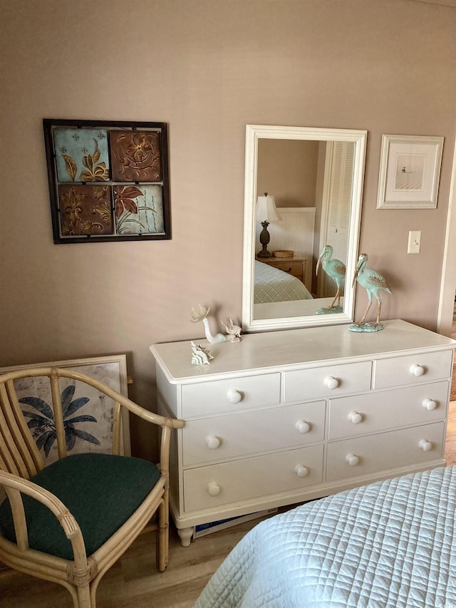 bedroom with wood-type flooring