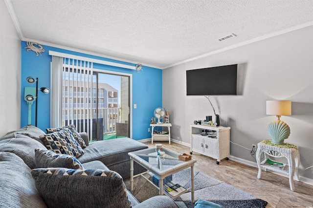 living room featuring ornamental molding and a textured ceiling