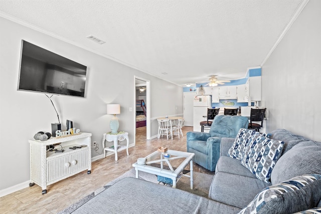 living room with ornamental molding, a textured ceiling, and ceiling fan