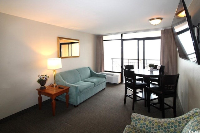 carpeted living room featuring a wall mounted air conditioner