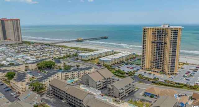 aerial view featuring a water view and a view of the beach