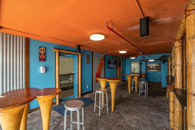 dining area with a textured ceiling