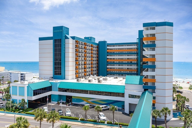 view of building exterior with a water view