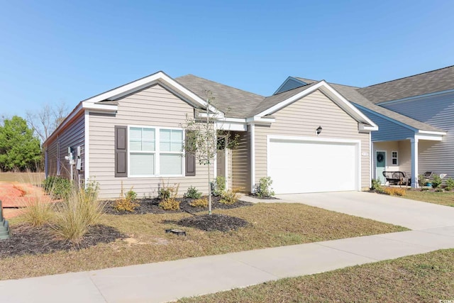 ranch-style home with a front lawn and a garage