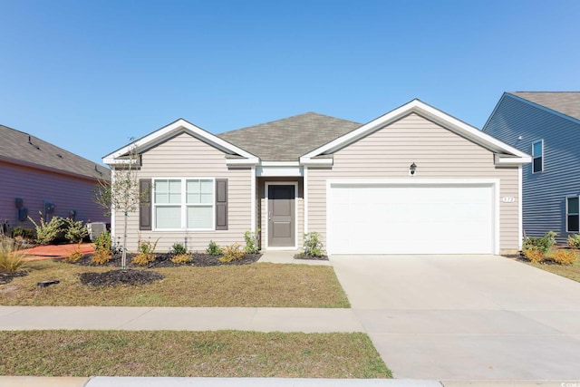 single story home with a front lawn and a garage