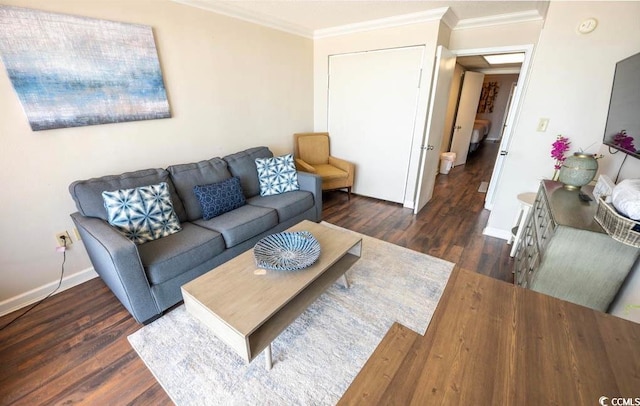 living room featuring ornamental molding and dark hardwood / wood-style floors