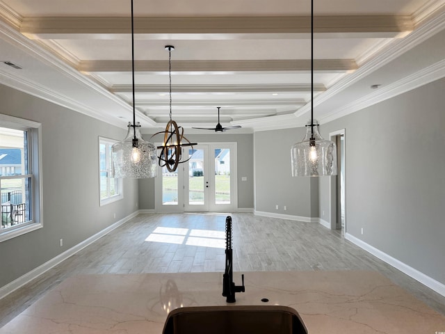 interior space with french doors, ceiling fan, beam ceiling, sink, and ornamental molding