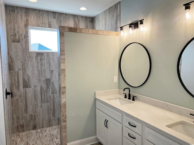 bathroom featuring dual vanity