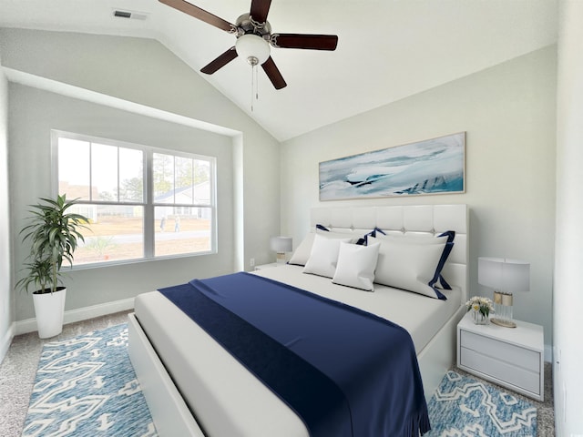 bedroom with carpet flooring, vaulted ceiling, and ceiling fan