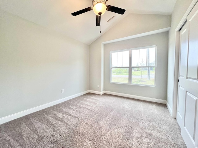 1424 Nathan Dr, Loris, SC 29569 - unfurnished bedroom with a closet, visible vents, lofted ceiling, baseboards, and carpet