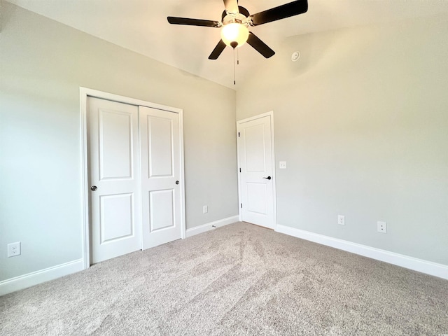 1424 Nathan Dr, Loris, SC 29569 - unfurnished bedroom featuring a ceiling fan, baseboards, a closet, lofted ceiling, and carpet