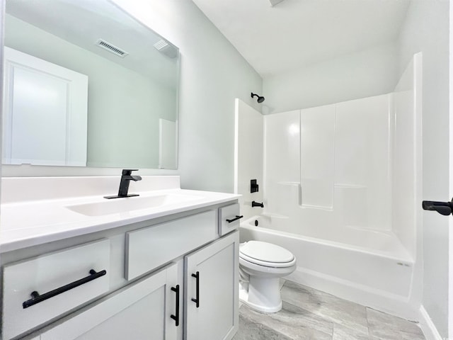 full bathroom featuring vanity, toilet, and shower / bathtub combination