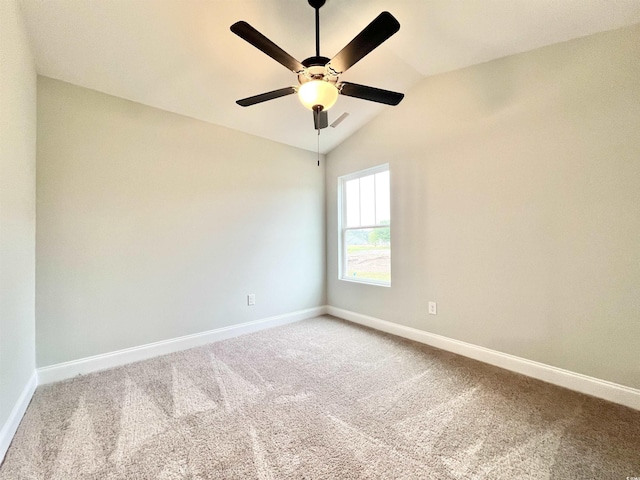 1424 Nathan Dr, Loris, SC 29569 - spare room featuring baseboards, lofted ceiling, ceiling fan, and carpet