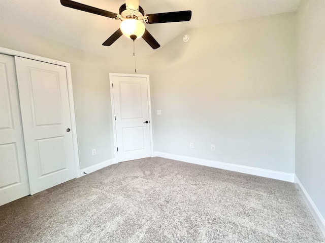 1424 Nathan Dr, Loris, SC 29569 - unfurnished bedroom featuring baseboards, carpet, a closet, and lofted ceiling