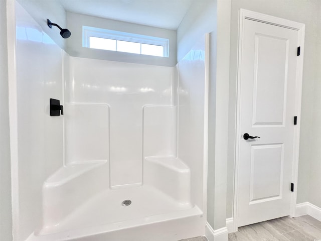 1424 Nathan Dr, Loris, SC 29569 - bathroom featuring baseboards and a shower