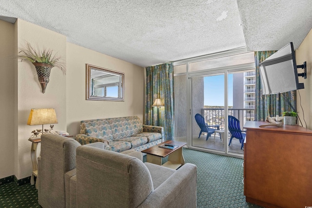 living room featuring a textured ceiling and dark carpet