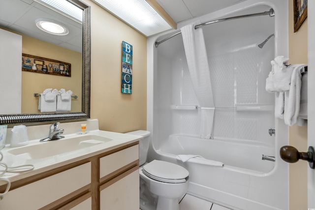 full bathroom featuring vanity, shower / bath combination with curtain, tile floors, and toilet