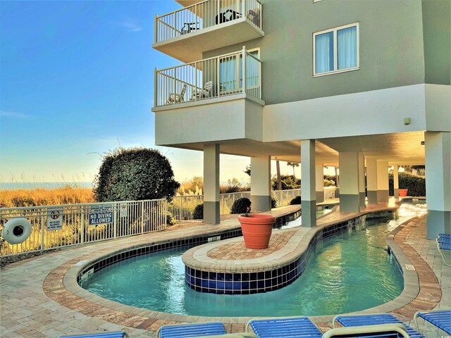 view of pool with a patio area