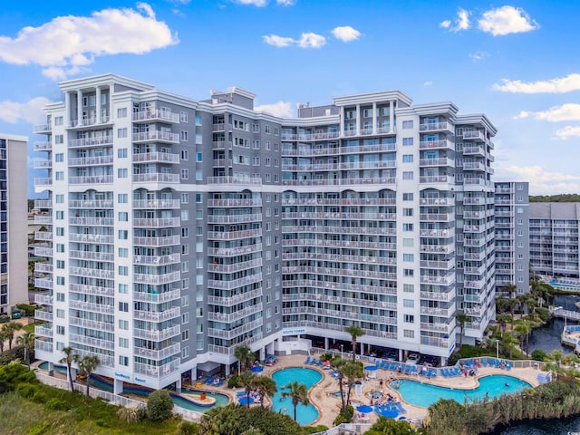 view of property with a community pool