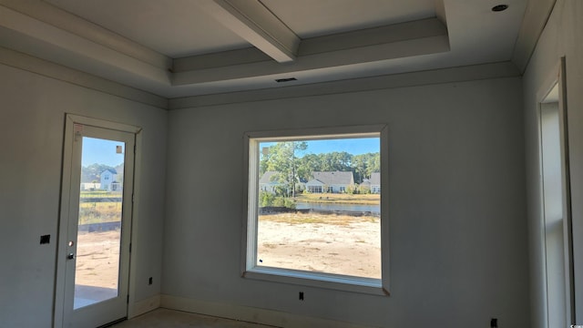 interior space with beam ceiling and plenty of natural light