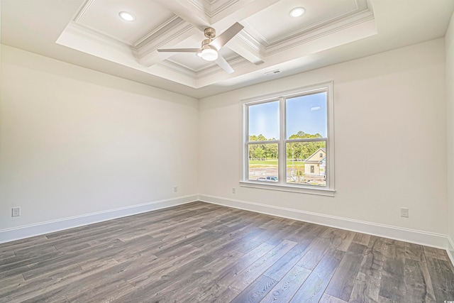 unfurnished room with coffered ceiling, beamed ceiling, ornamental molding, dark hardwood / wood-style flooring, and ceiling fan