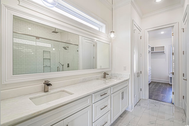 bathroom featuring vanity, an enclosed shower, hardwood / wood-style floors, and crown molding