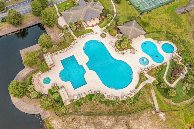 birds eye view of property featuring a water view