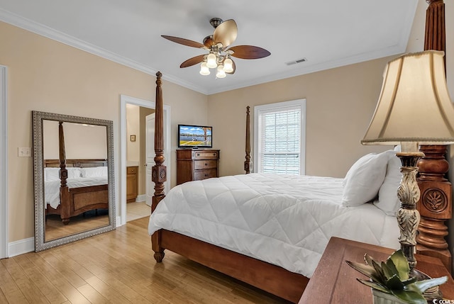 bedroom featuring ornamental molding, ceiling fan, and light wood-type flooring