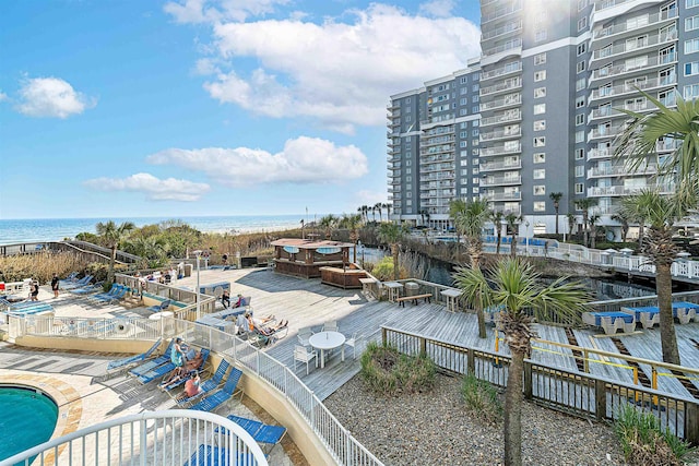 exterior space with a water view and a patio area