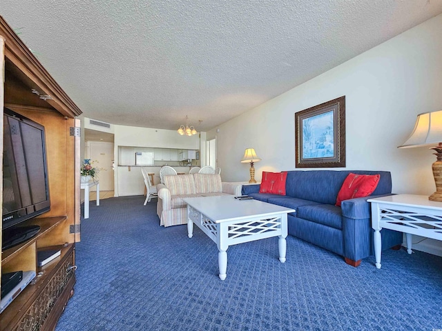 9820 Queensway Blvd Unit 501, Myrtle Beach, SC 29572 - living room with a chandelier, carpet, and a textured ceiling