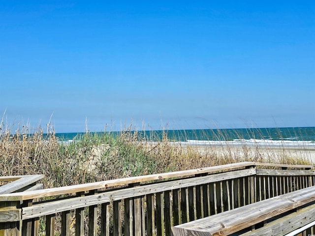 surrounding community featuring a water view