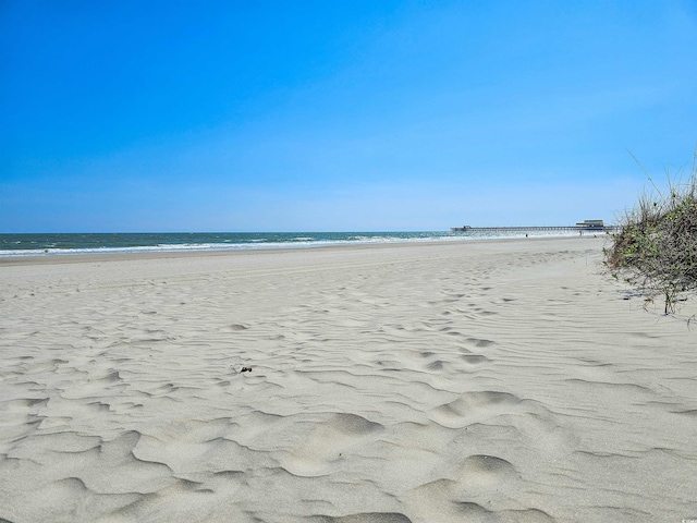 exterior space featuring a beach view