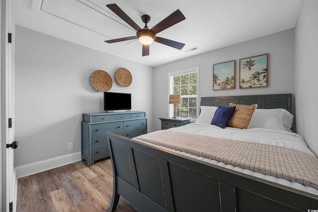 bedroom featuring ceiling fan and wood-type flooring