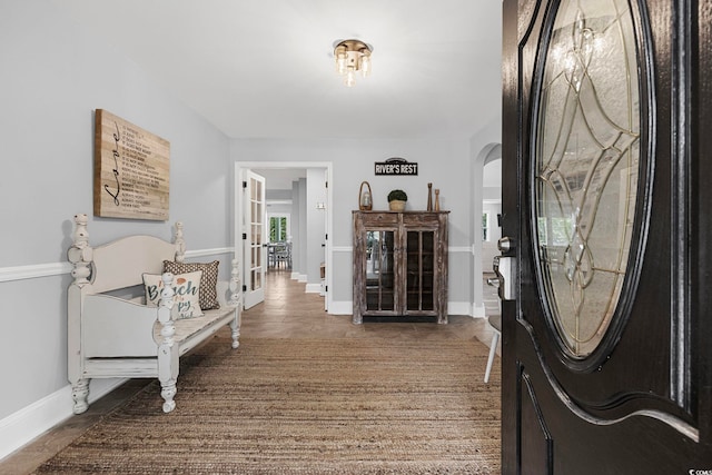 tiled entryway featuring french doors