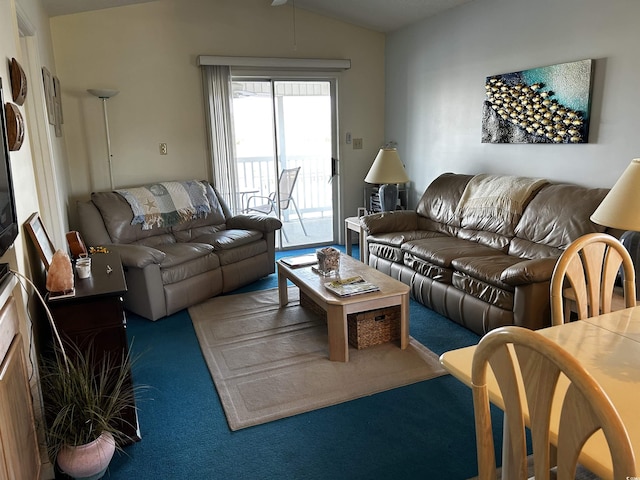 carpeted living room with vaulted ceiling