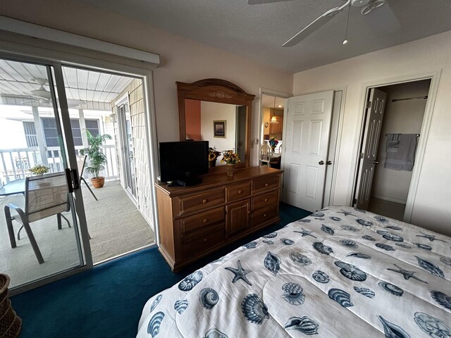 carpeted bedroom featuring ceiling fan, access to outside, and a textured ceiling