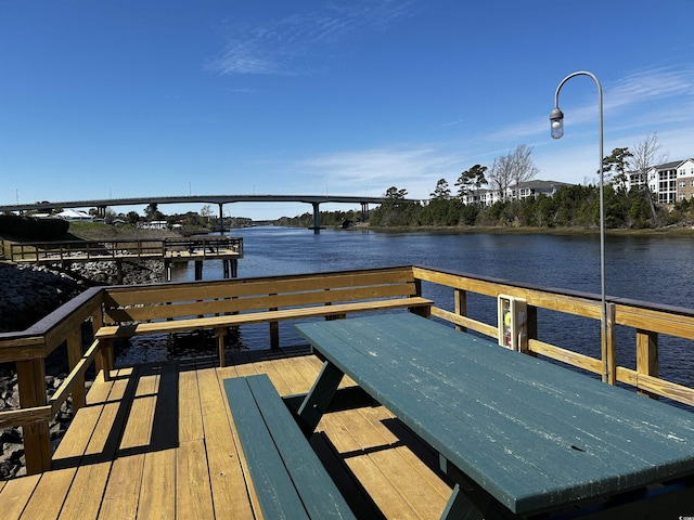 dock area featuring a water view